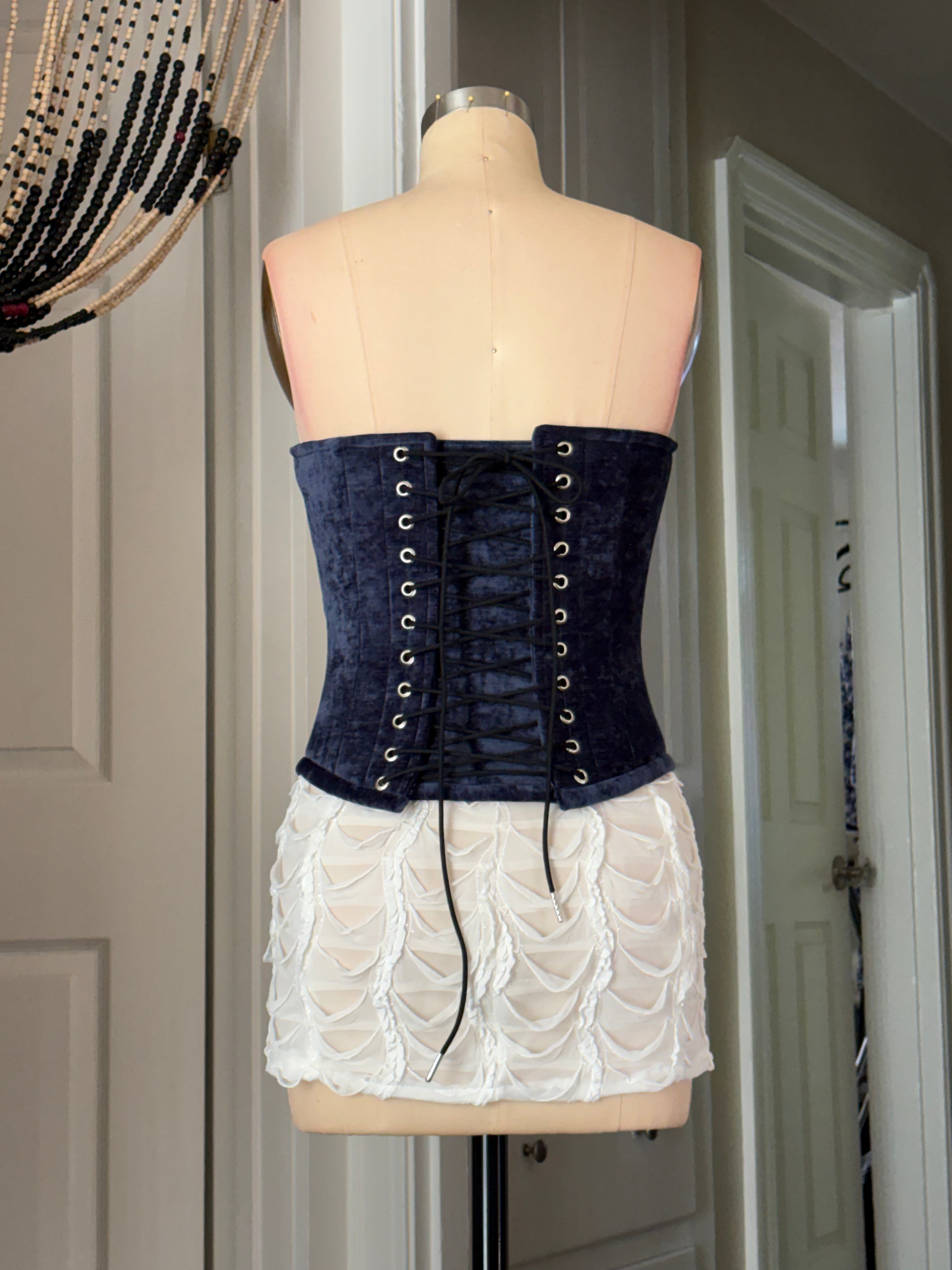 Blue curved corset